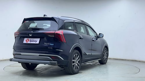 Used 2024 Mahindra XUV700 AX7 Luxury Pack Petrol AT 7 STR Petrol Automatic exterior RIGHT REAR CORNER VIEW