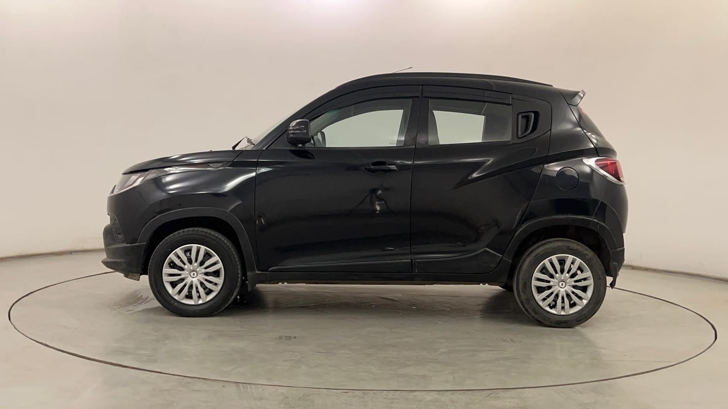 Used 2016 Mahindra KUV100 K6 6 STR Petrol Manual exterior LEFT SIDE VIEW
