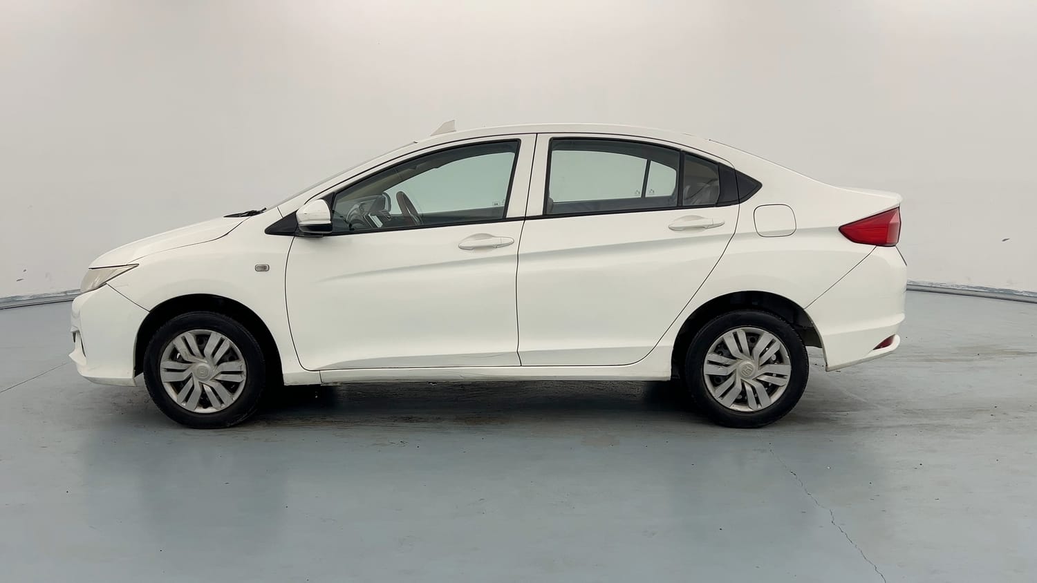 Used 2014 Honda City S Petrol Manual exterior LEFT SIDE VIEW