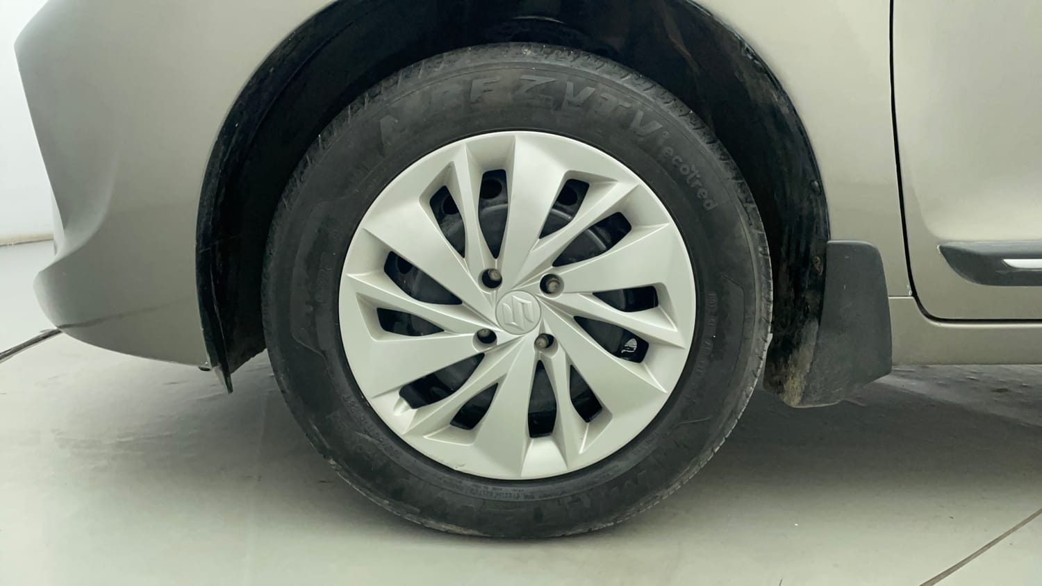 Used 2021 Maruti Suzuki Baleno Delta Petrol Manual tyres LEFT FRONT TYRE RIM VIEW