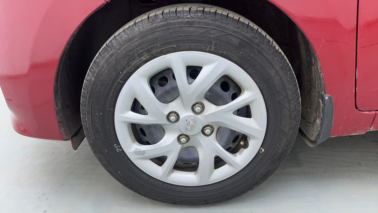 Used 2019 Hyundai Grand i10 Sportz 1.2 Kappa VTVT Petrol Manual tyres LEFT FRONT TYRE RIM VIEW