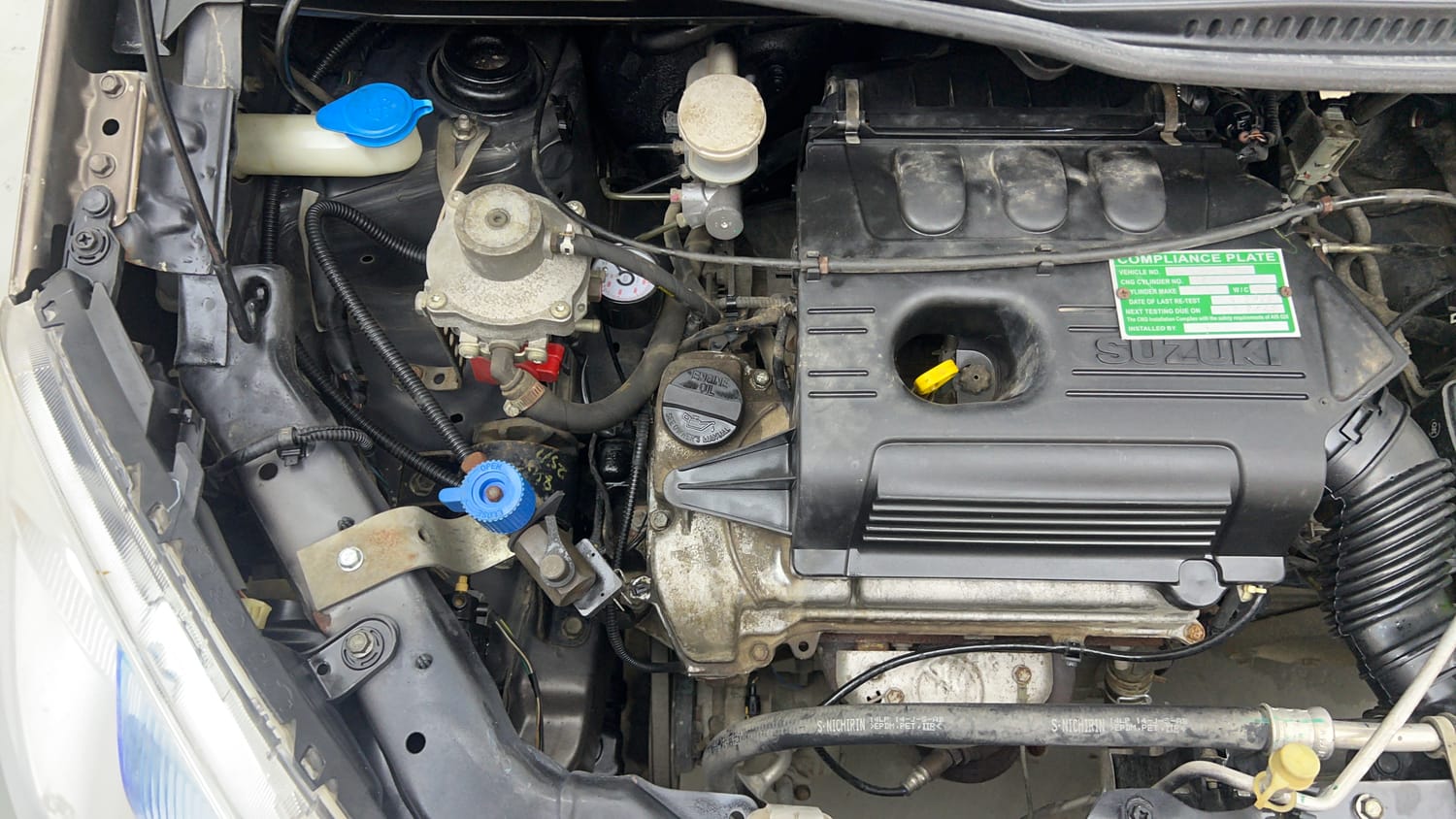 Used 2016 Maruti Suzuki Wagon R 1.0 VXI Petrol + CNG (Outside Fitted) Cng Manual engine ENGINE RIGHT SIDE VIEW
