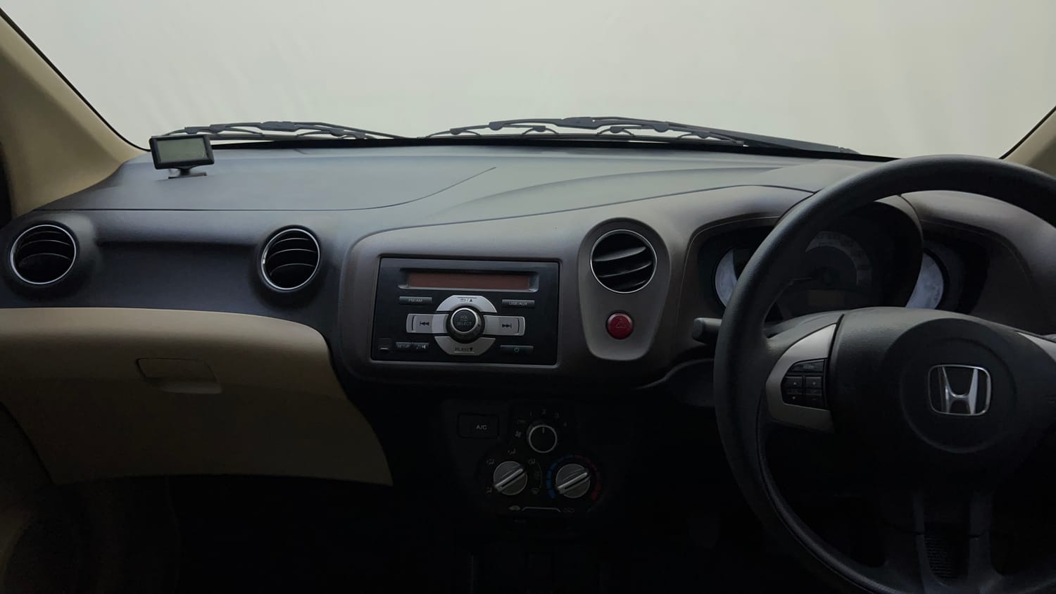 Used 2013 Honda Brio S MT Petrol Manual interior MUSIC SYSTEM & AC CONTROL VIEW