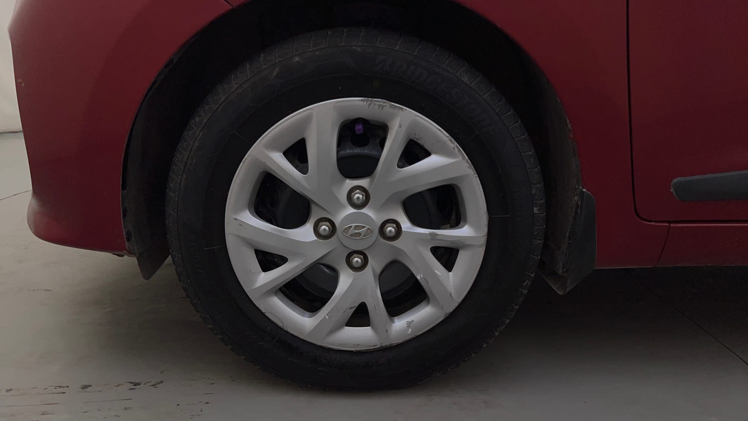 Used 2019 Hyundai Grand i10 Sportz 1.2 Kappa VTVT Petrol Manual tyres LEFT FRONT TYRE RIM VIEW