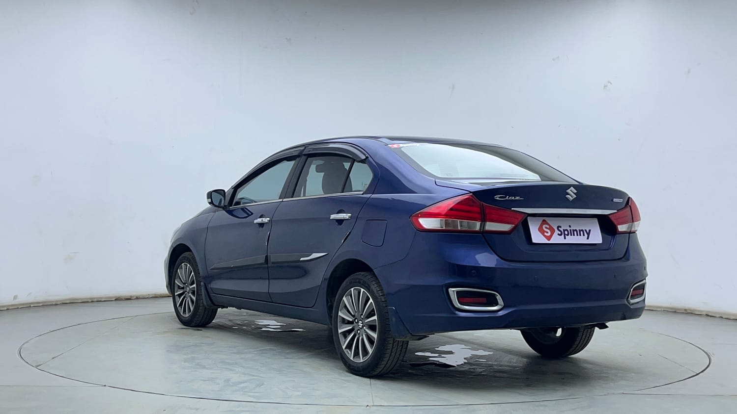 Used 2021 Maruti Suzuki Ciaz Alpha Hybrid 1.5 Petrol Manual exterior LEFT REAR CORNER VIEW