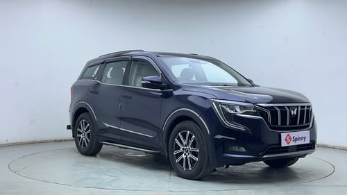 Used 2024 Mahindra XUV700 AX7 Luxury Pack Petrol AT 7 STR Petrol Automatic exterior RIGHT FRONT CORNER VIEW