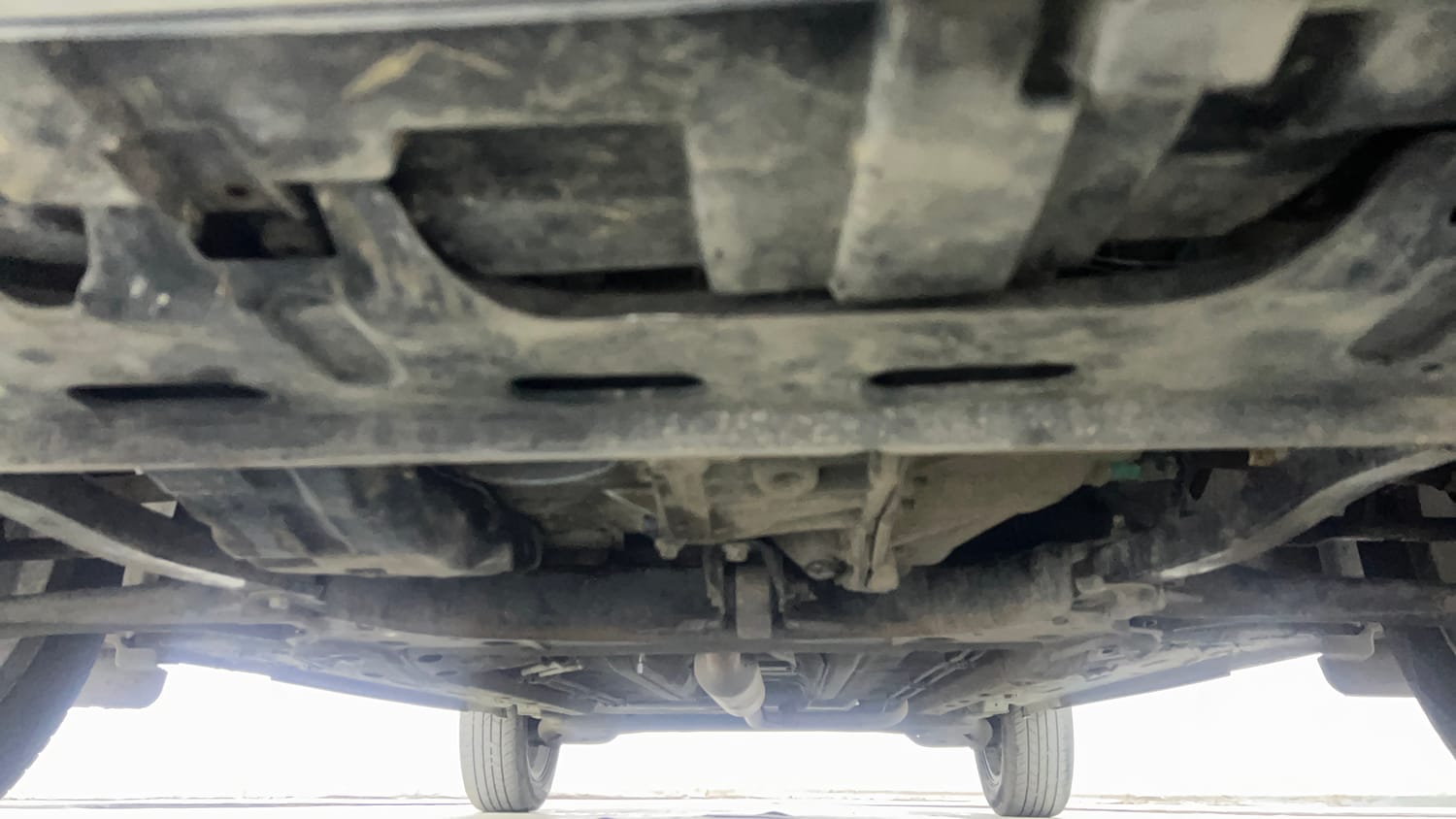 Used 2021 Nissan Magnite XV Premium Turbo Petrol Manual extra FRONT LEFT UNDERBODY VIEW