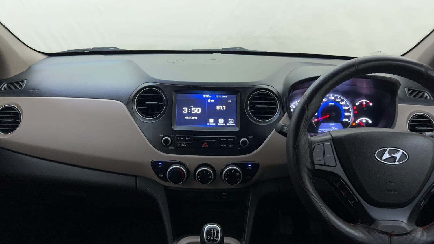 Used 2019 Hyundai Grand i10 Sportz 1.2 Kappa VTVT Petrol Manual interior MUSIC SYSTEM & AC CONTROL VIEW