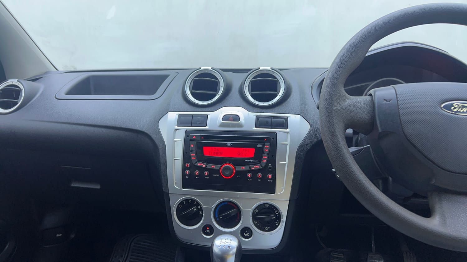 Used 2013 Ford Figo Duratec Petrol ZXI 1.2 Petrol Manual interior MUSIC SYSTEM & AC CONTROL VIEW