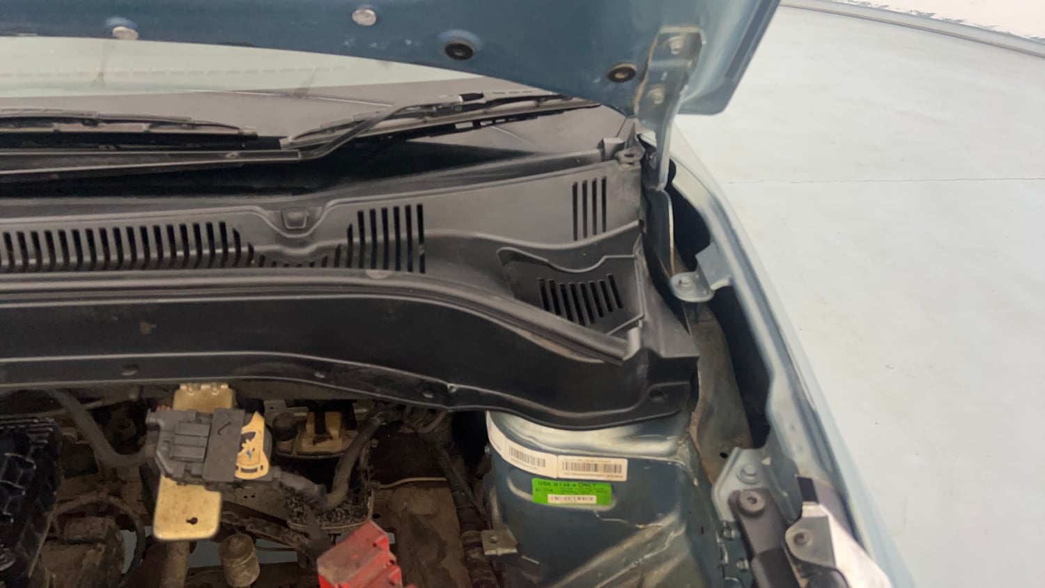 Used 2022 Tata Punch Creative Dual Tone Petrol Manual engine ENGINE LEFT SIDE HINGE & APRON VIEW