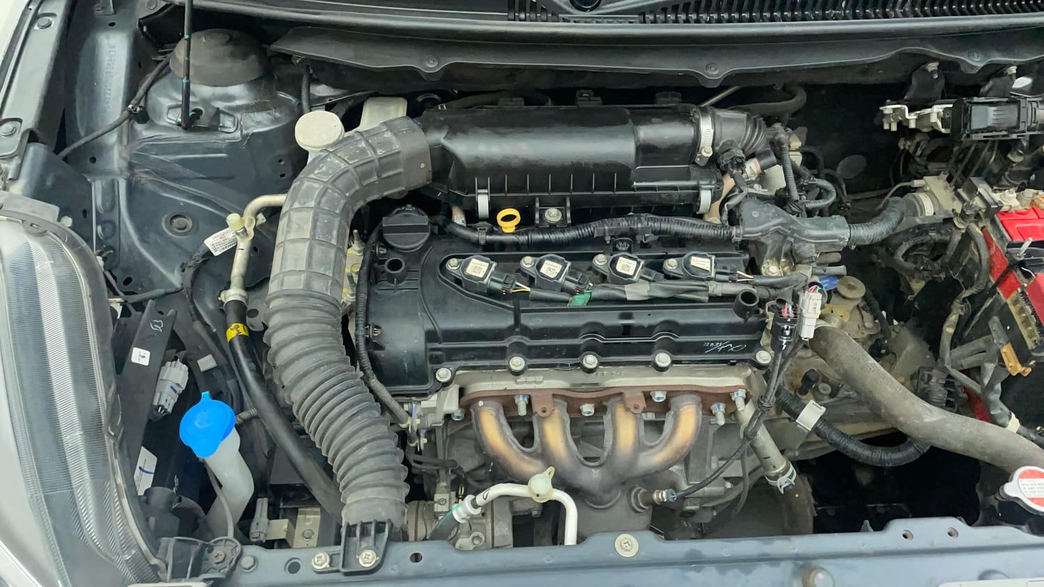 Used 2021 Maruti Suzuki Baleno Delta Petrol Manual engine ENGINE RIGHT SIDE VIEW