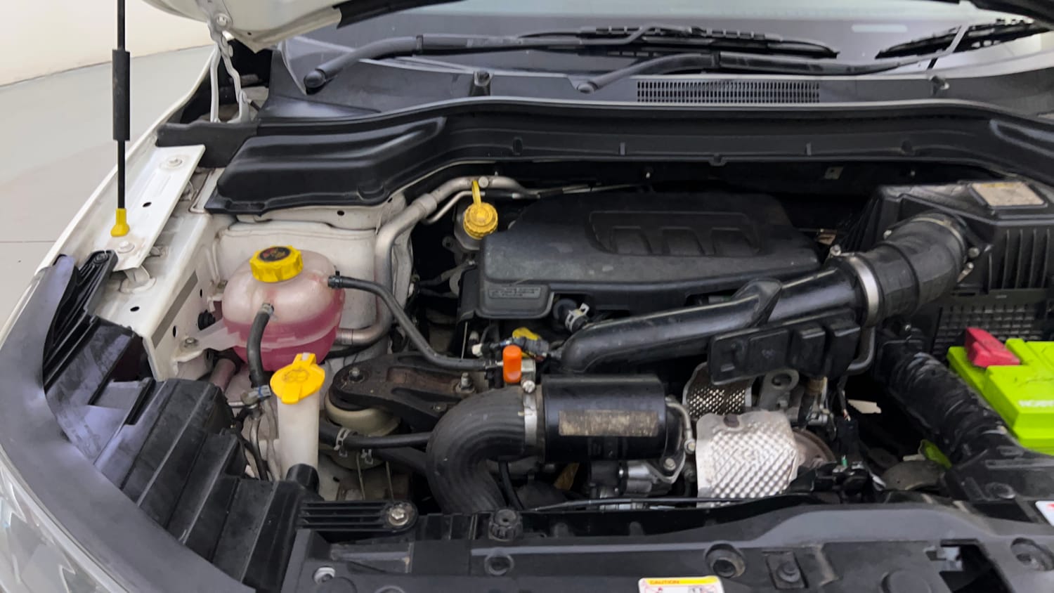 Used 2021 Mahindra XUV 300 W8 1.2 Petrol Petrol Manual engine ENGINE RIGHT SIDE HINGE & APRON VIEW