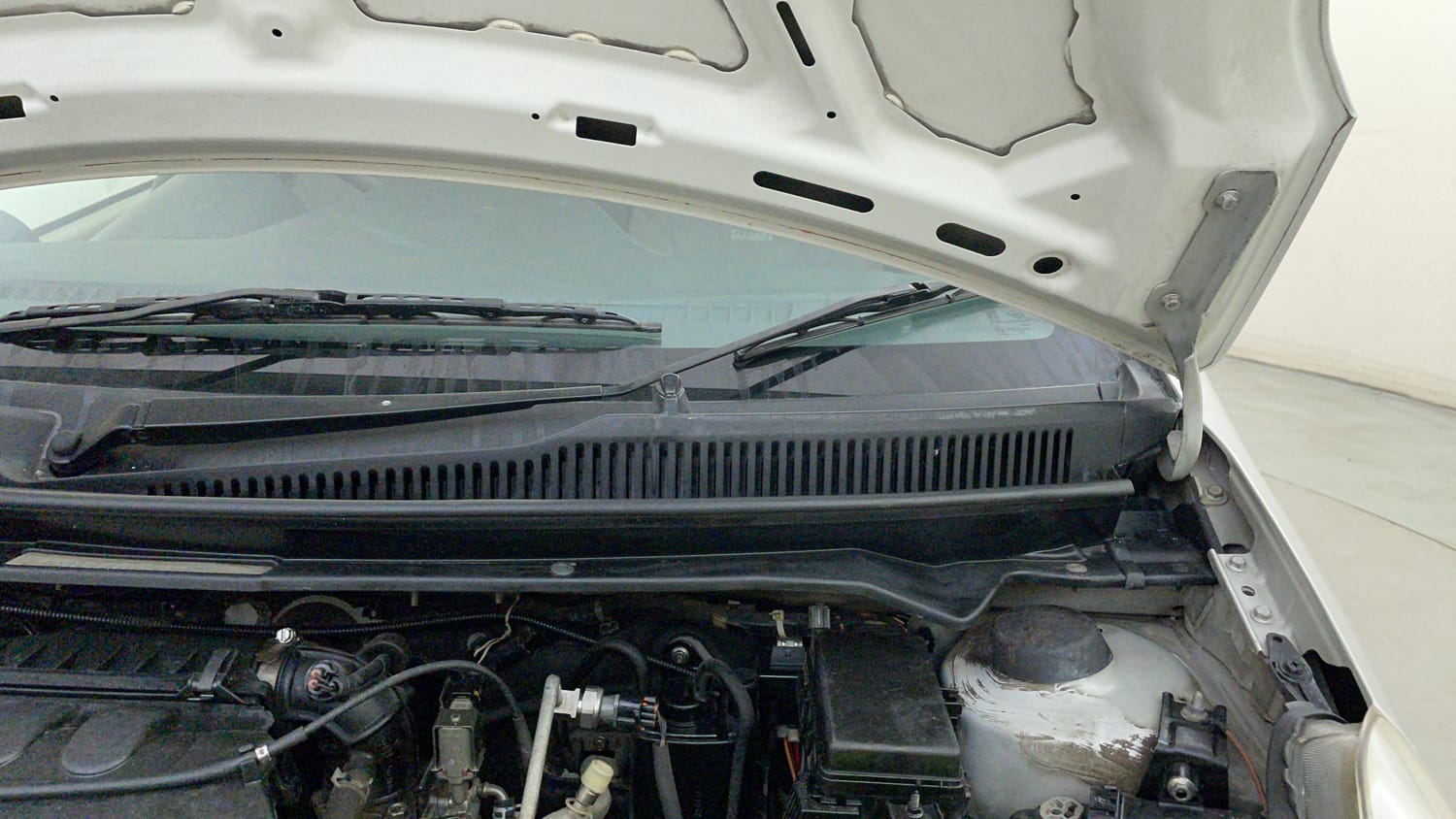 Used 2012 Maruti Suzuki A-Star Vxi (ABS) AT Petrol Automatic engine ENGINE LEFT SIDE HINGE & APRON VIEW