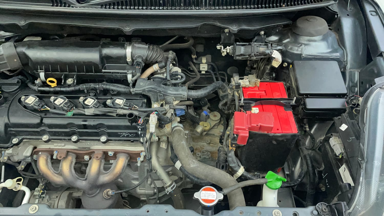 Used 2021 Maruti Suzuki Baleno Delta Petrol Manual engine ENGINE LEFT SIDE VIEW