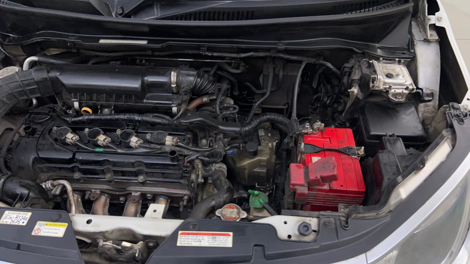 Used 2018 Maruti Suzuki Ignis [2017-2020] Zeta AMT Petrol Dual Tone Petrol Automatic engine ENGINE LEFT SIDE VIEW