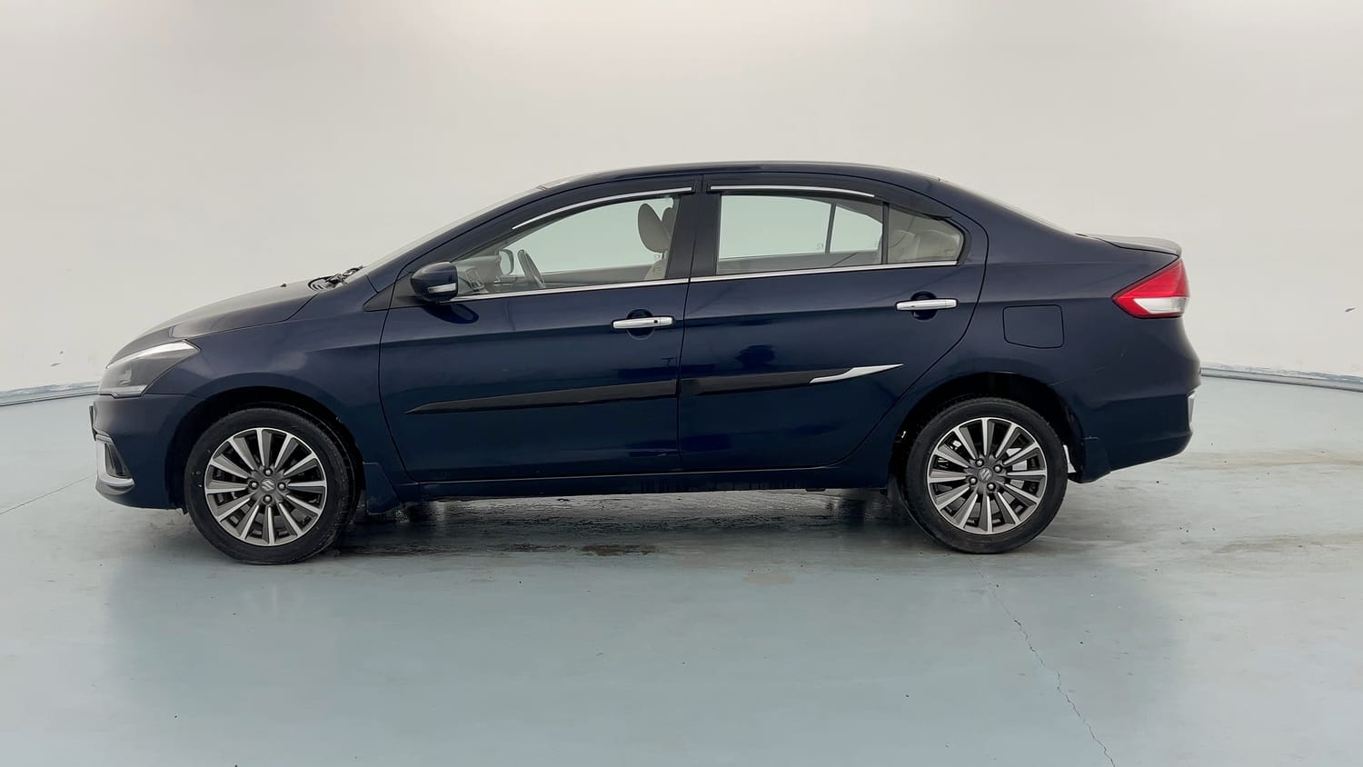Used 2023 Maruti Suzuki Ciaz Alpha 1.5 Petrol Manual exterior LEFT SIDE VIEW