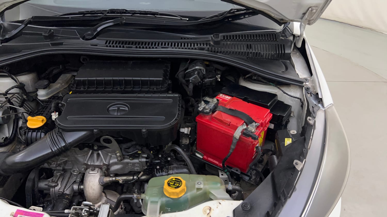 Used 2022 Tata Tiago XZA Plus Petrol Automatic engine ENGINE LEFT SIDE HINGE & APRON VIEW
