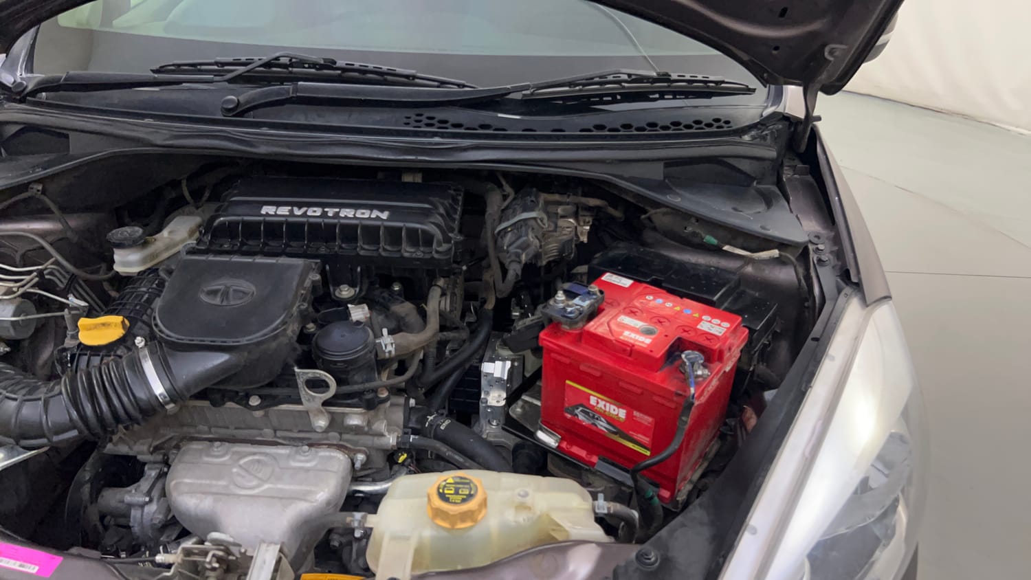 Used 2018 Tata Tiago Revotron XZA Petrol Automatic engine ENGINE LEFT SIDE HINGE & APRON VIEW