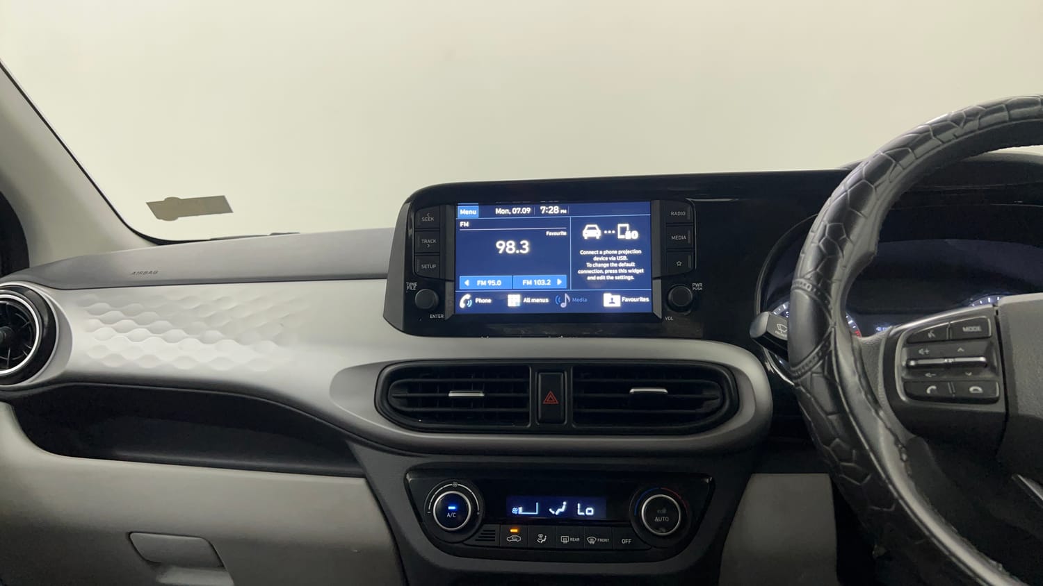 Used 2023 Hyundai Grand i10 Nios Sportz 1.2 Kappa VTVT CNG Cng Manual interior MUSIC SYSTEM & AC CONTROL VIEW