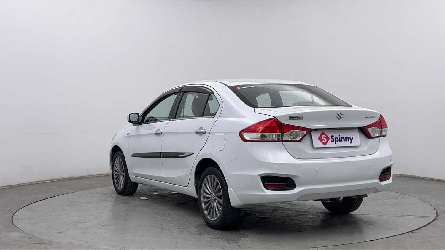 Used 2015 Maruti Suzuki Ciaz ZXI+ Petrol Manual exterior LEFT REAR CORNER VIEW