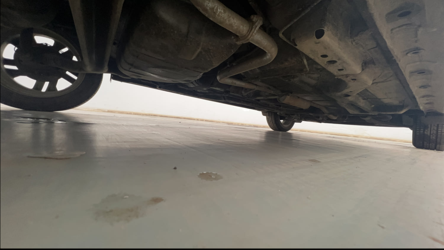 Used 2023 Tata Tigor XZA Plus Leatherette Pack Petrol Automatic extra REAR RIGHT UNDERBODY VIEW