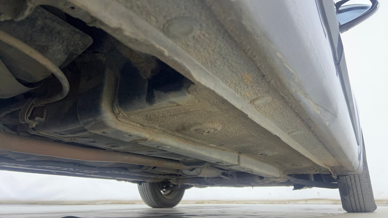 Used 2014 Hyundai Grand i10 Asta AT 1.2 Kappa VTVT Petrol Automatic extra REAR RIGHT UNDERBODY VIEW