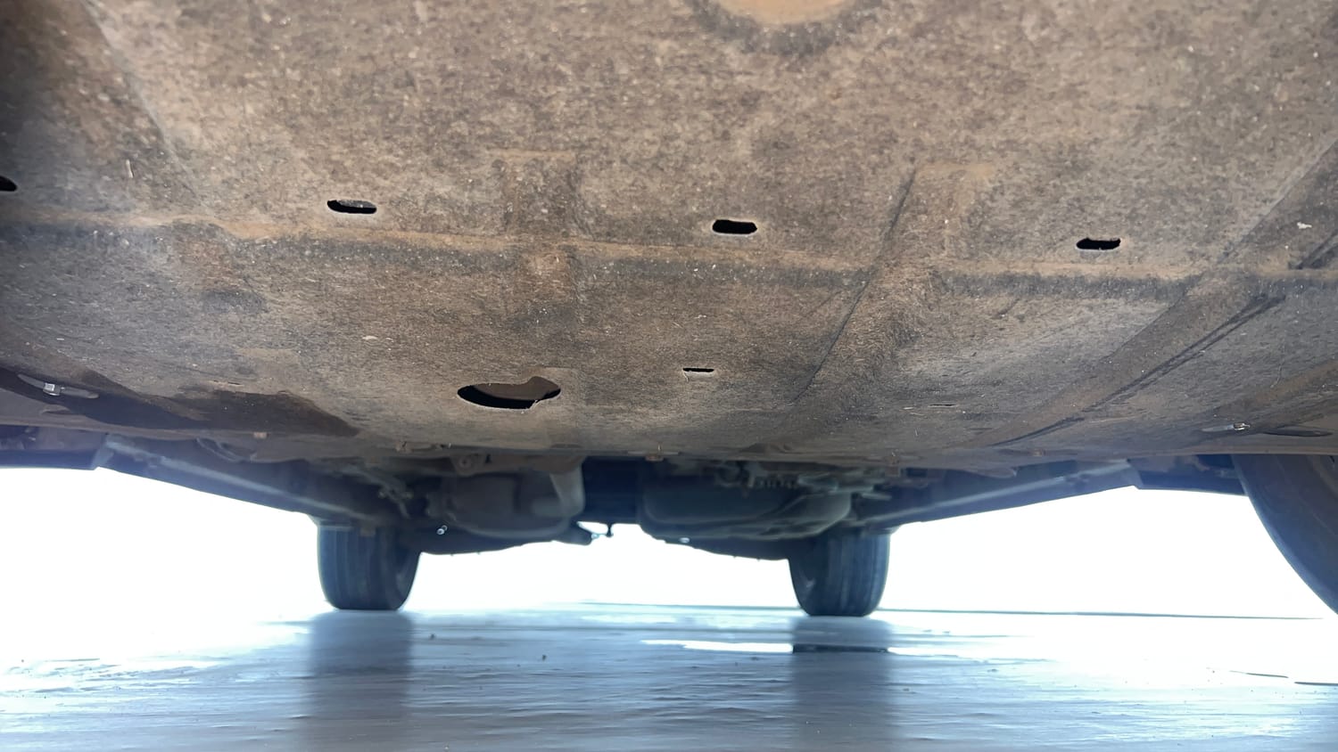 Used 2021 Mahindra XUV700 AX 7 Petrol AT Luxury Pack 7 STR Petrol Automatic extra FRONT LEFT UNDERBODY VIEW