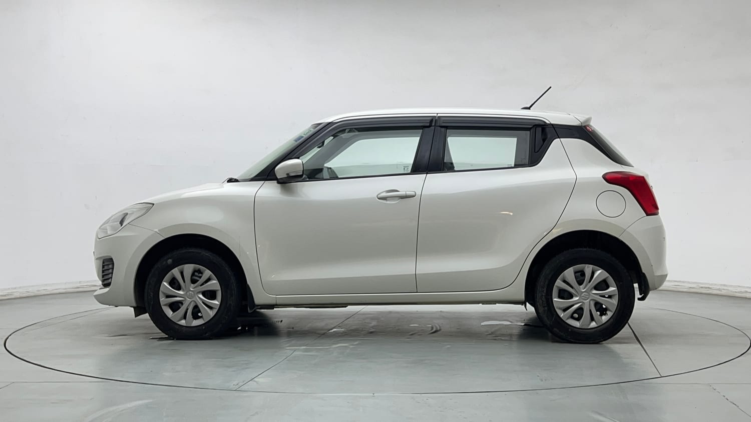 Used 2021 Maruti Suzuki Swift VXi Petrol Manual exterior LEFT SIDE VIEW