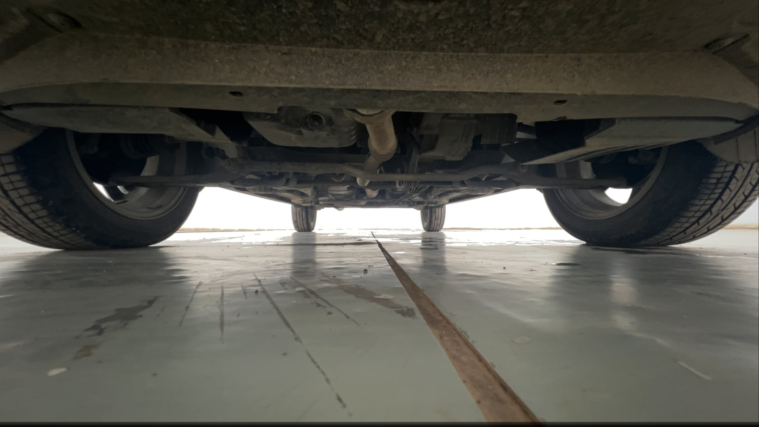 Used 2023 Tata Tigor XZA Plus Leatherette Pack Petrol Automatic extra FRONT LEFT UNDERBODY VIEW