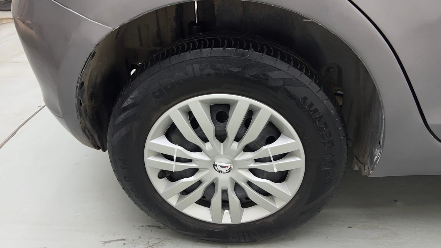 Used 2015 Maruti Suzuki Swift VXi Petrol Manual tyres RIGHT REAR TYRE RIM VIEW