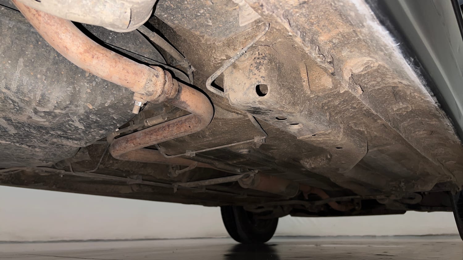 Used 2018 Tata Tigor Revotron XZA Petrol Automatic extra REAR RIGHT UNDERBODY VIEW