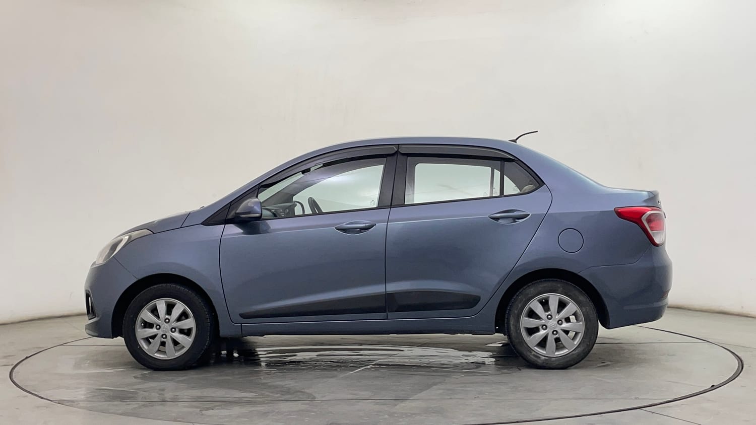 Used 2016 Hyundai Xcent SX 1.2 Petrol Manual exterior LEFT SIDE VIEW