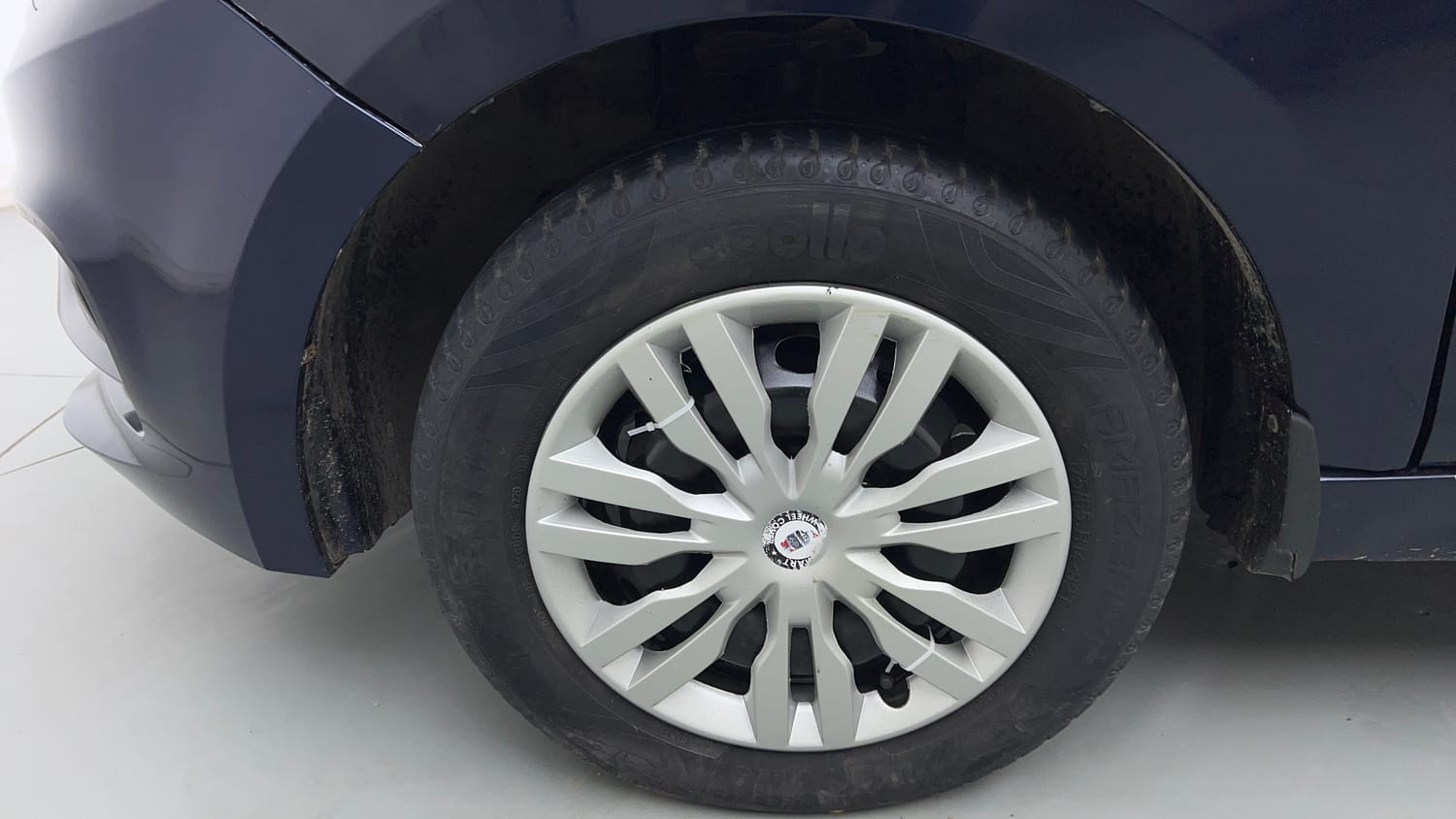 Used 2020 Tata Tigor XM Petrol Manual tyres LEFT FRONT TYRE RIM VIEW