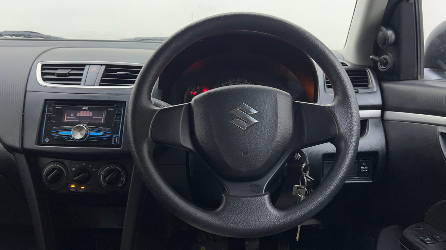 Used 2015 Maruti Suzuki Swift Lxi (O) Petrol Manual interior STEERING VIEW