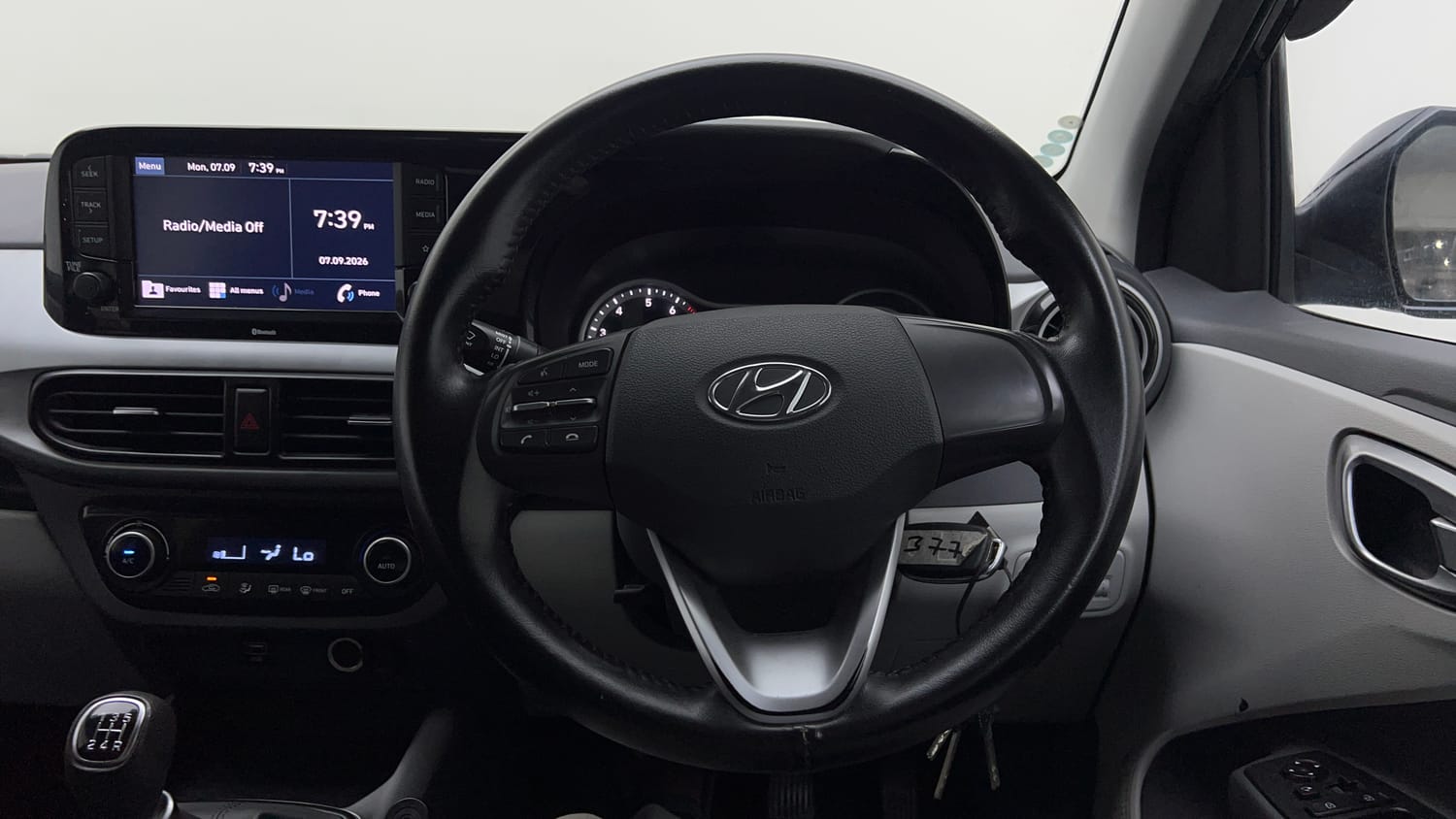 Used 2022 Hyundai Grand i10 Nios Sportz 1.2 Kappa VTVT Petrol Manual interior STEERING VIEW