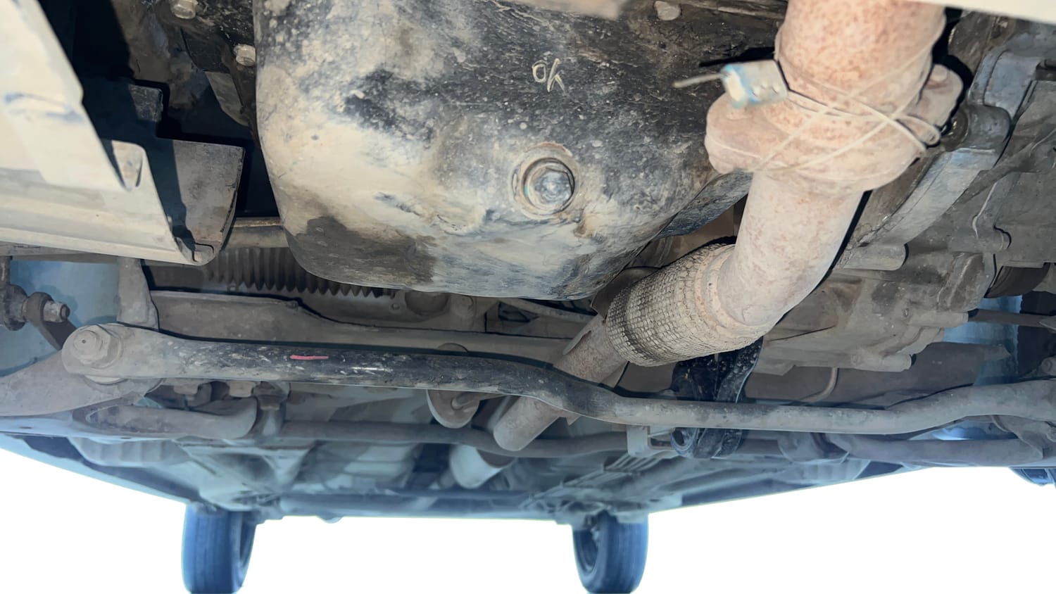 Used 2022 Tata Tigor XZ Plus CNG Cng Manual extra FRONT LEFT UNDERBODY VIEW