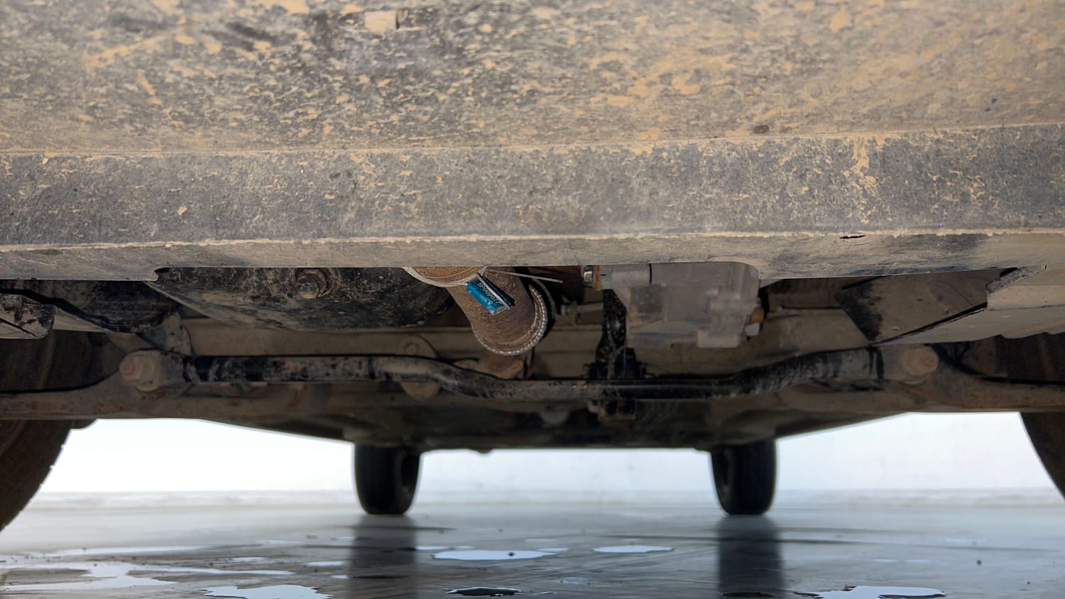 Used 2020 Tata Tigor XM Petrol Manual extra FRONT LEFT UNDERBODY VIEW