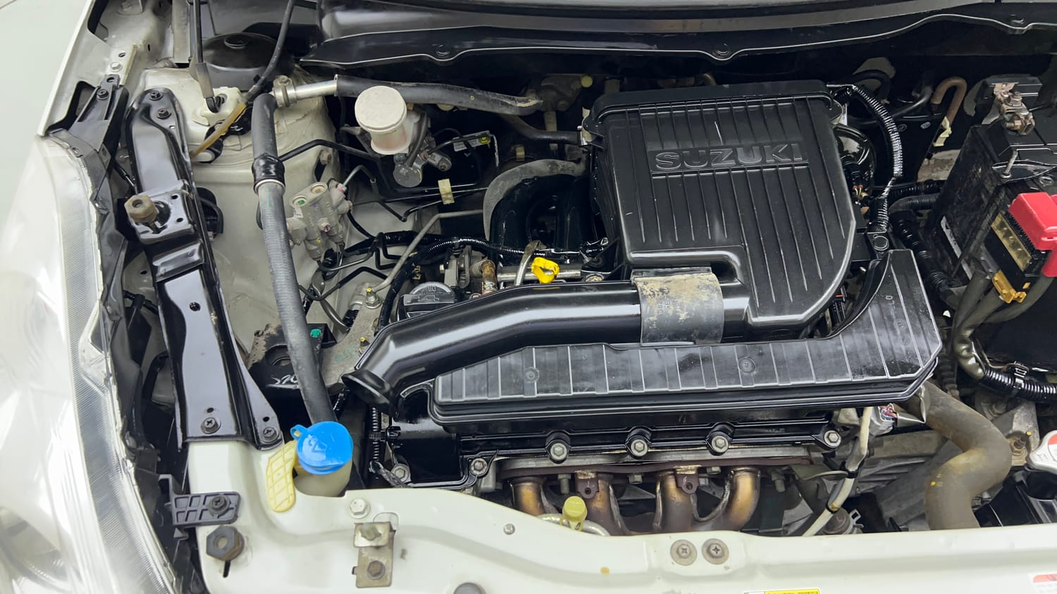 Used 2015 Maruti Suzuki Swift Lxi (O) Petrol Manual engine ENGINE RIGHT SIDE VIEW