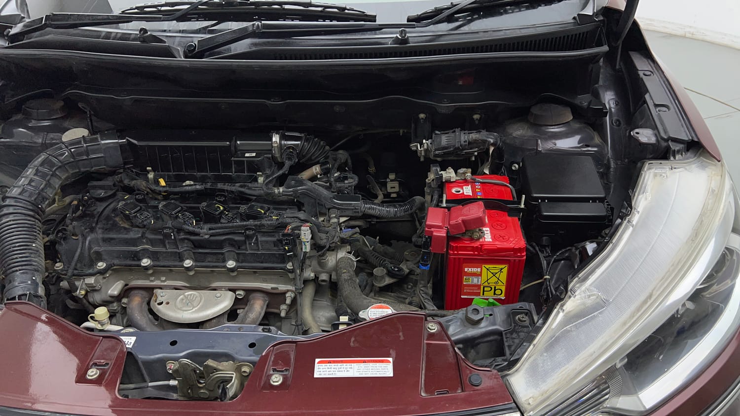 Used 2022 Maruti Suzuki New Ertiga VXi Petrol Manual engine ENGINE LEFT SIDE VIEW