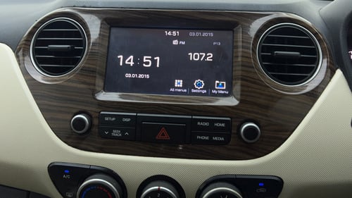 Used 2018 Hyundai Grand i10 Sportz 1.2 Kappa VTVT Petrol Manual top_features Integrated (in-dash) music system