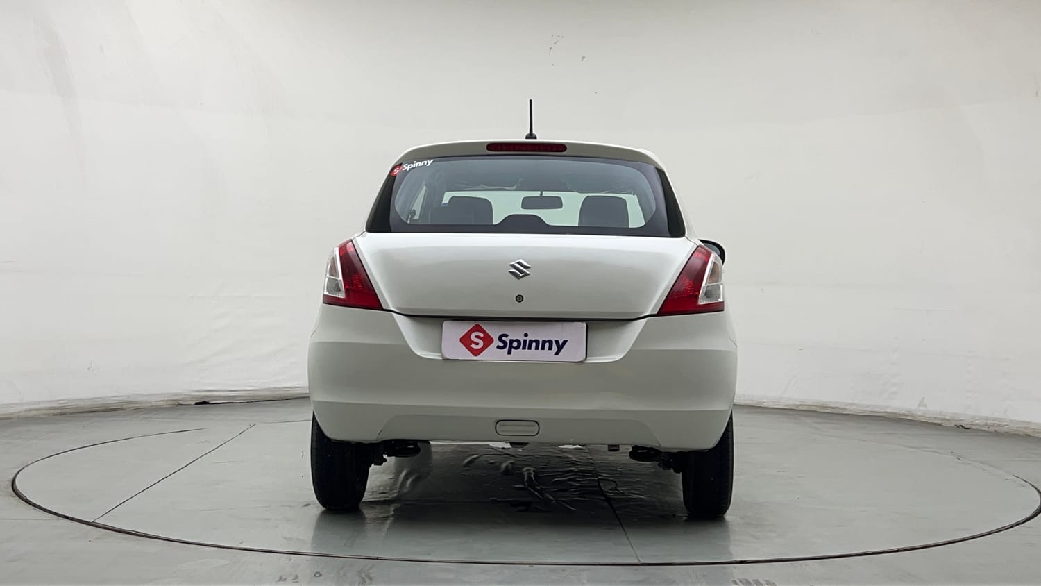 Used 2015 Maruti Suzuki Swift Lxi (O) Petrol Manual exterior BACK VIEW