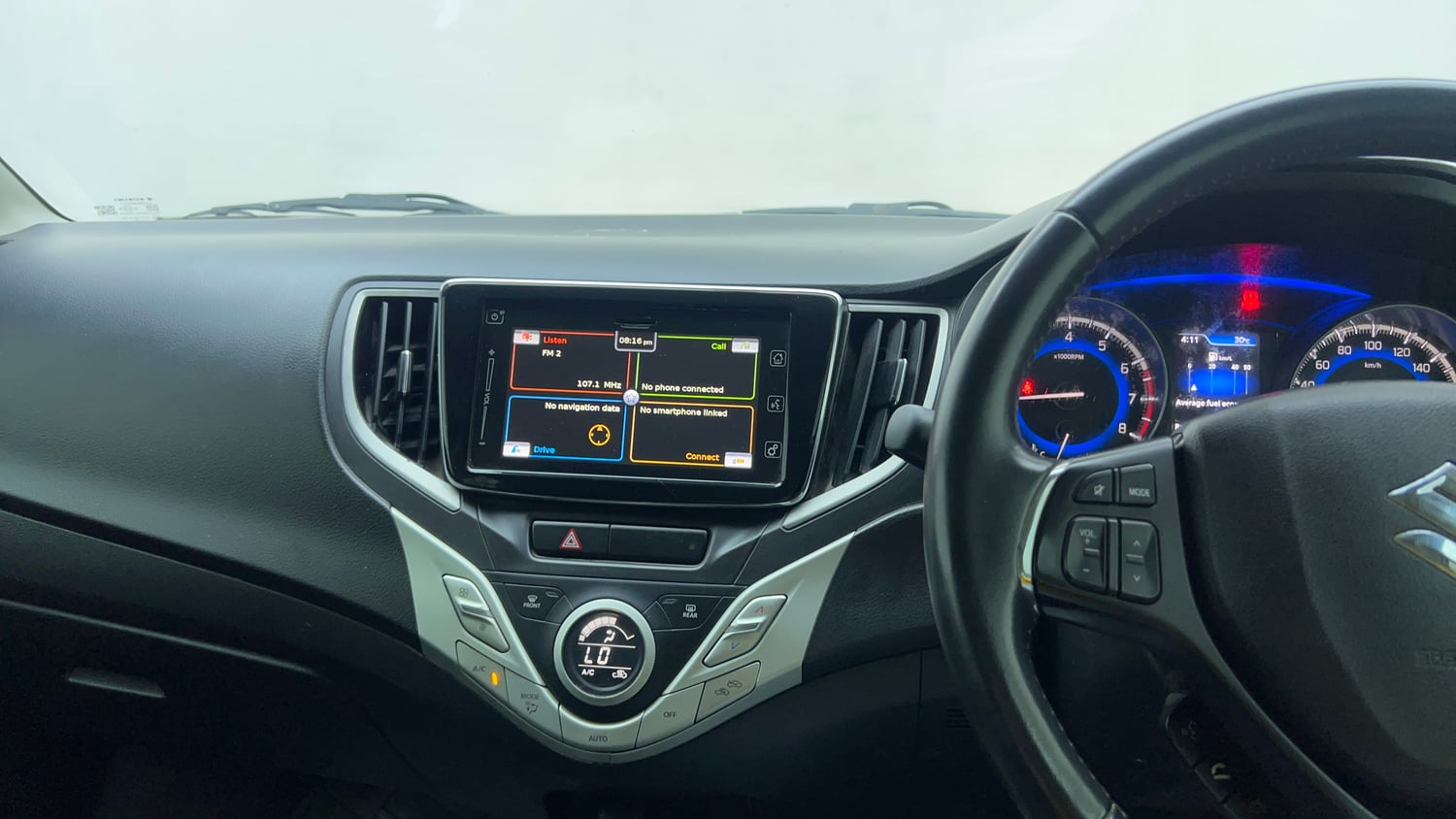 Used 2018 Maruti Suzuki Baleno Alpha 1.2 Petrol Manual top_features Integrated (in-dash) music system