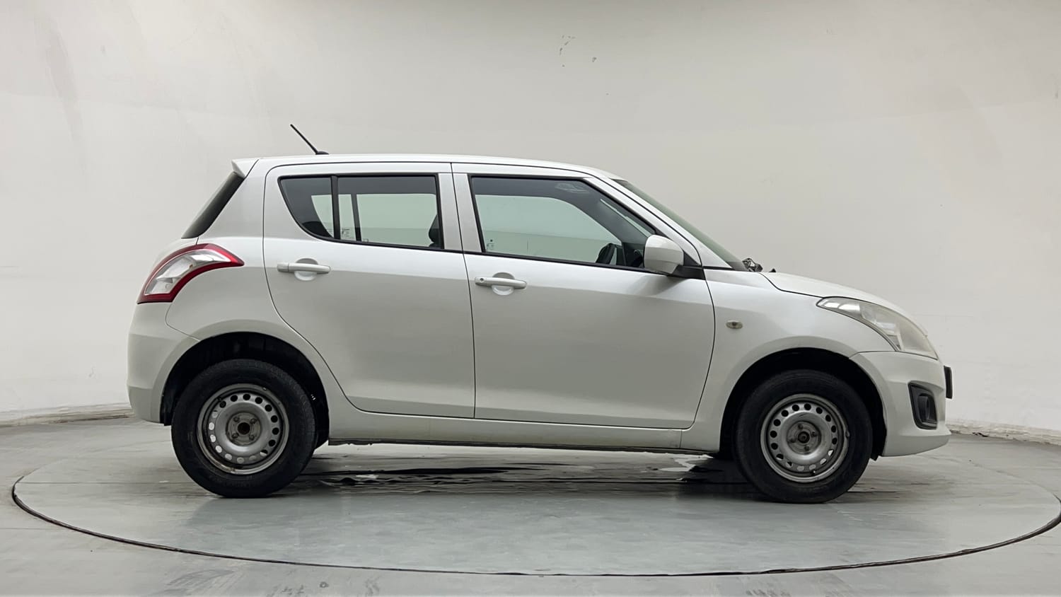 Used 2015 Maruti Suzuki Swift Lxi (O) Petrol Manual exterior RIGHT SIDE VIEW