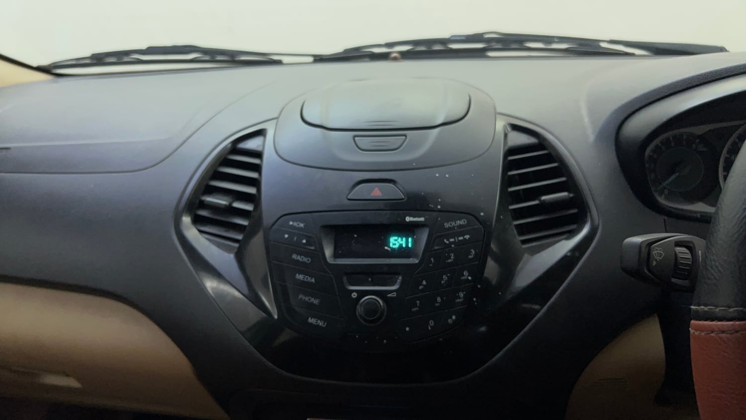 Used 2019 Ford Figo Aspire Titanium 1.2 Ti-VCT Petrol Manual top_features Integrated (in-dash) music system