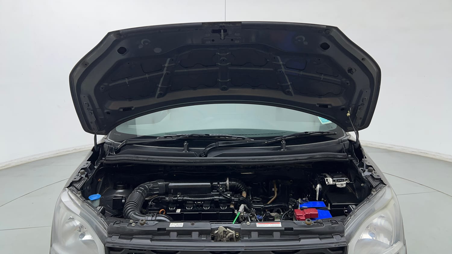 Used 2023 Maruti Suzuki Wagon R ZXI Plus 1.2 AGS Petrol Automatic engine ENGINE & BONNET OPEN FRONT VIEW