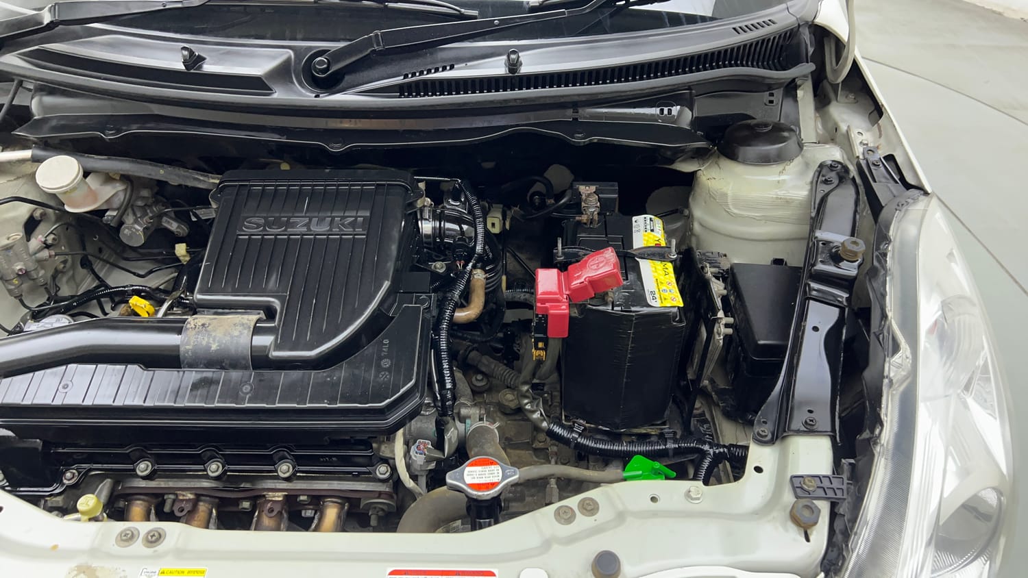 Used 2015 Maruti Suzuki Swift Lxi (O) Petrol Manual engine ENGINE LEFT SIDE VIEW