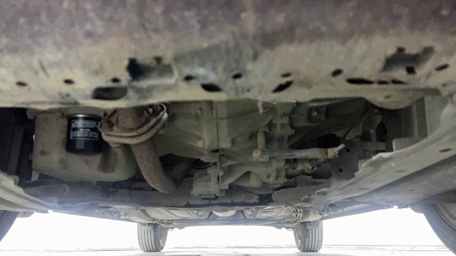 Used 2021 Maruti Suzuki Baleno Zeta Petrol Manual extra FRONT LEFT UNDERBODY VIEW