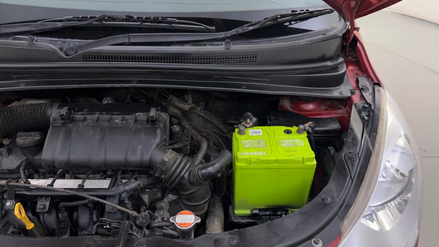 Used 2012 Hyundai i10 Sportz 1.2 Kappa2 Petrol Manual engine ENGINE LEFT SIDE HINGE & APRON VIEW