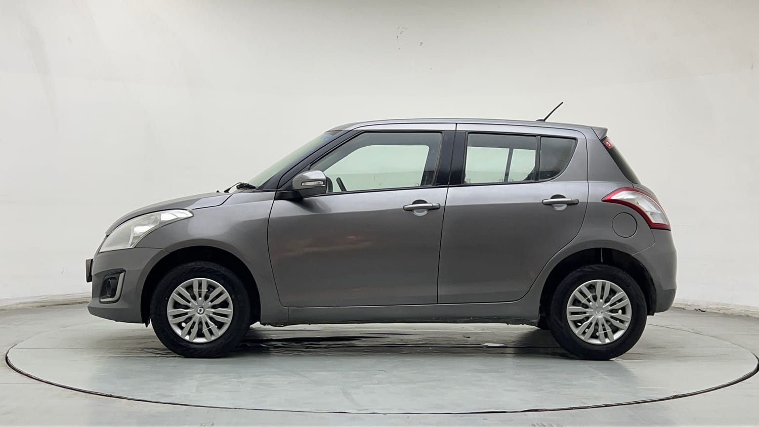 Used 2015 Maruti Suzuki Swift VXi Petrol Manual exterior LEFT SIDE VIEW