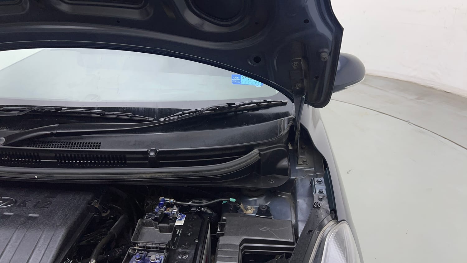 Used 2022 Hyundai Grand i10 Nios Sportz 1.2 Kappa VTVT Petrol Manual engine ENGINE LEFT SIDE HINGE & APRON VIEW